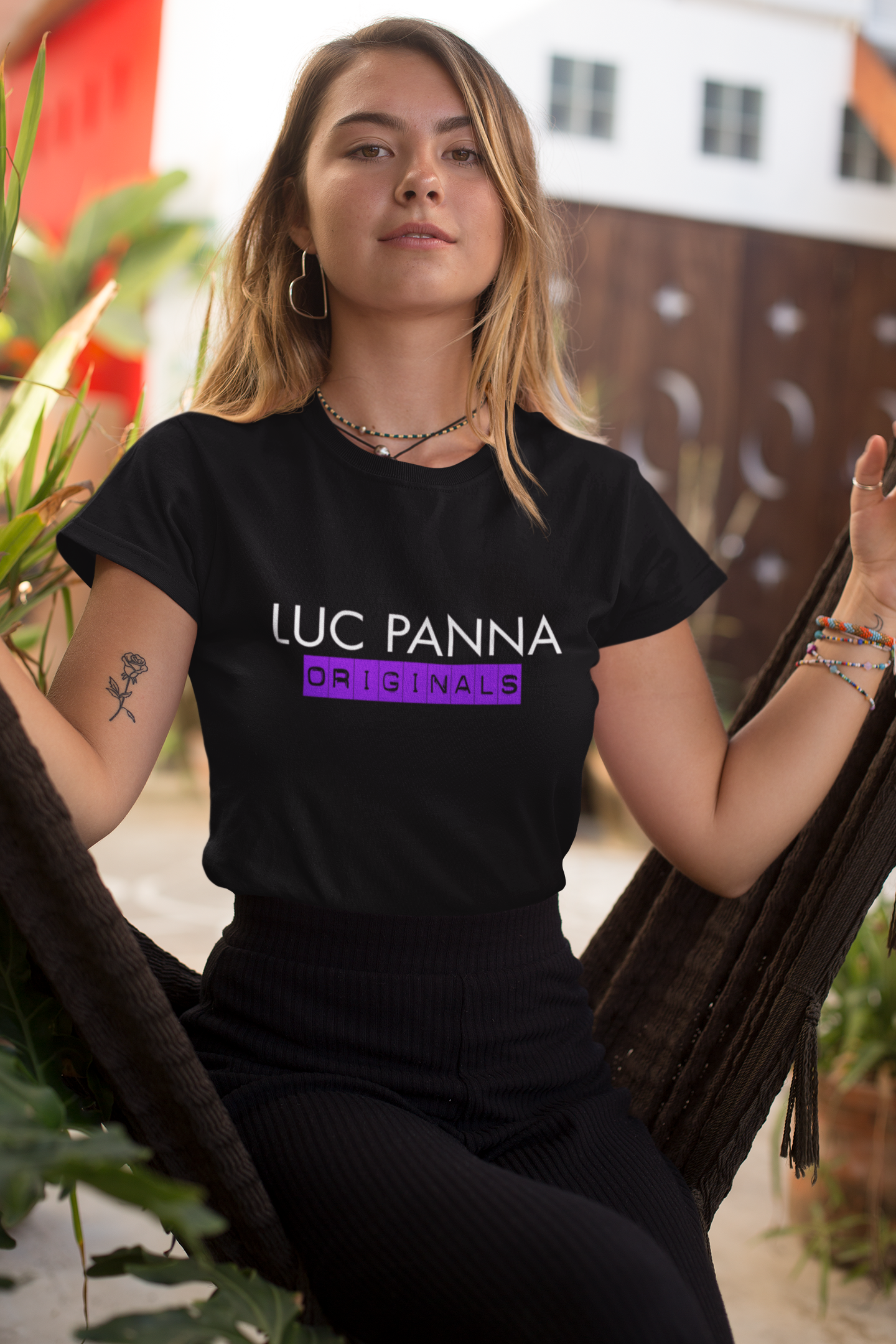 Luc Panna Originals t shirt mockup image for web young female sitting